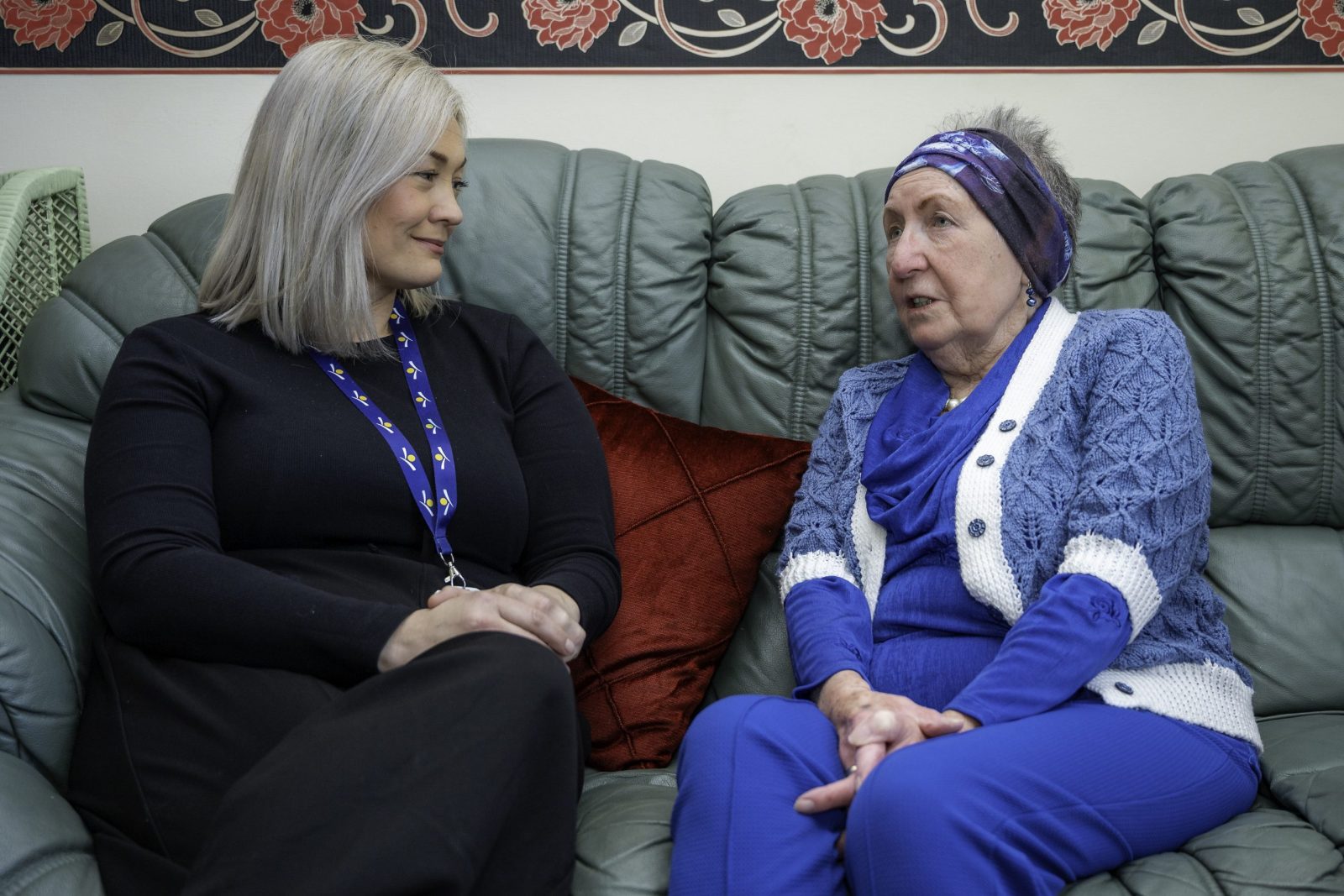 Hospice nurse supporting a patient in their home.